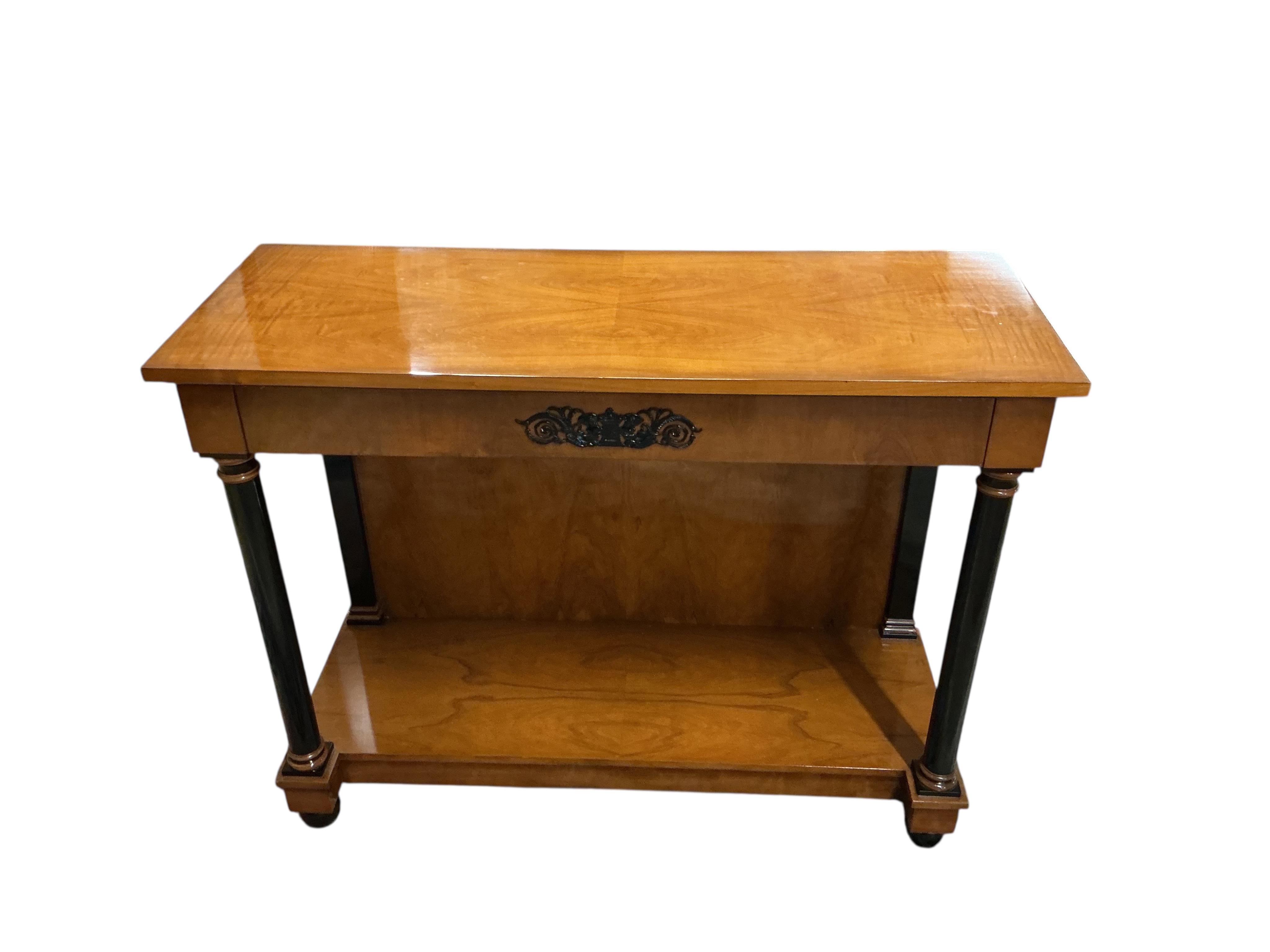 A pair of Biedermeier style cherry two tier console tables, with frieze drawers, width 110cm, depth 42cm, height 86cm